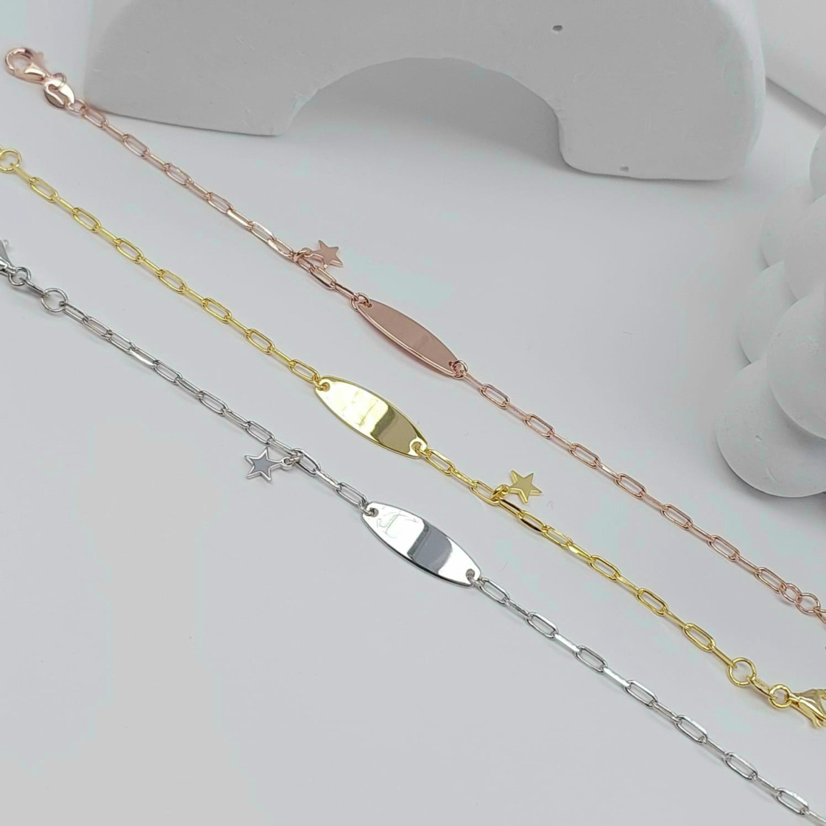 PULSERA CON CHAPA Y ESTRELLA