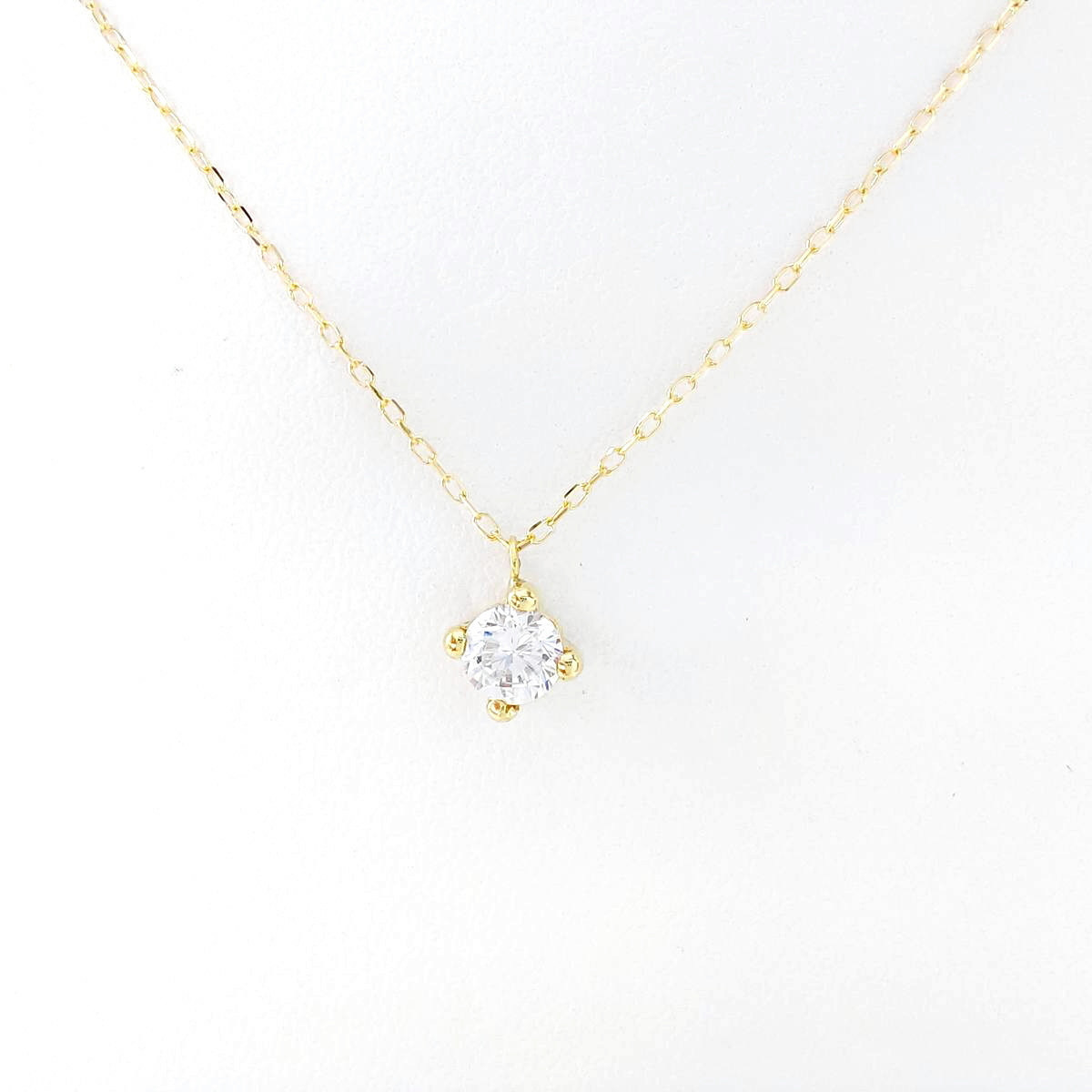 COLLAR 4 GARRAS ORO CIRCONITAS